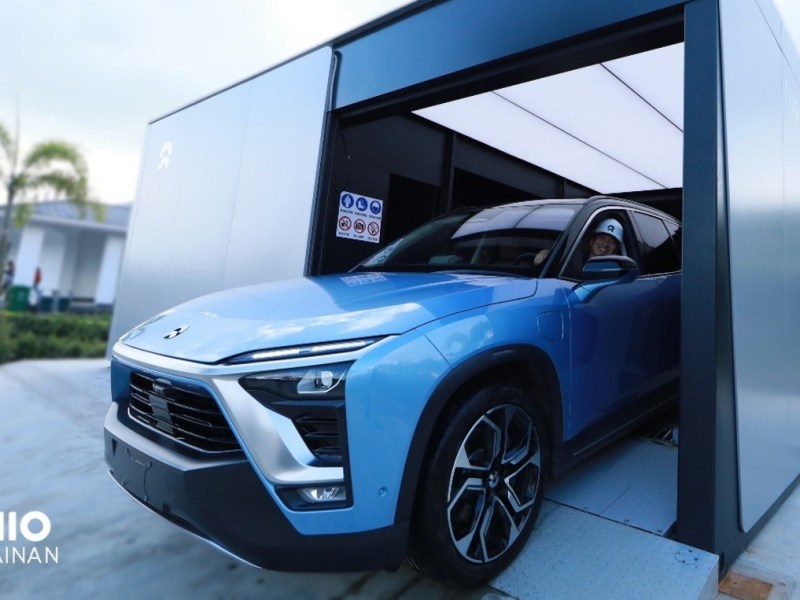 nio electric vehicles EV china tesla battery swap charging infrastructure